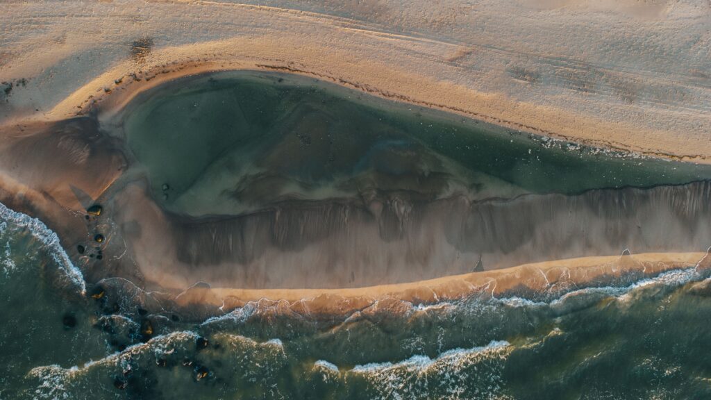 aerial view of the sandy seashore at Palanga, Lithuania, showcasing natural beauty.